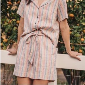 Marine layer matching rainbow button down shirt and shorts.